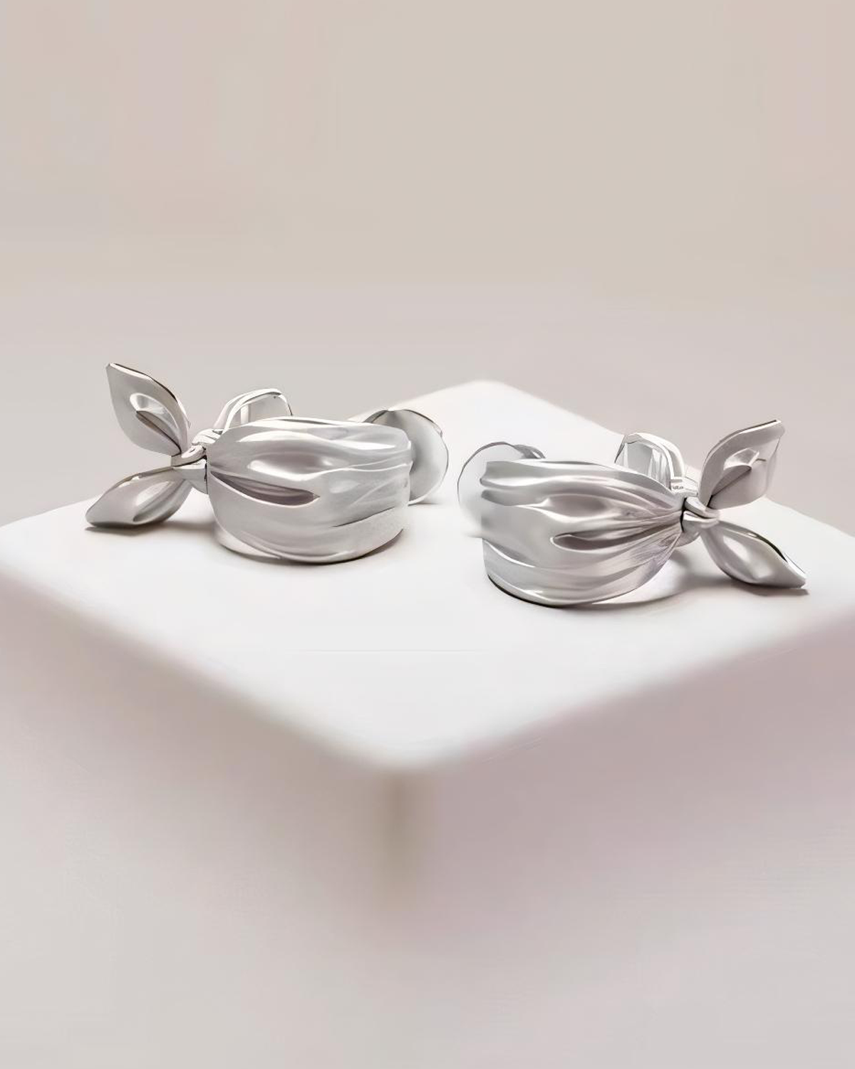 Joa Bow Tie Silver Stud Earrings