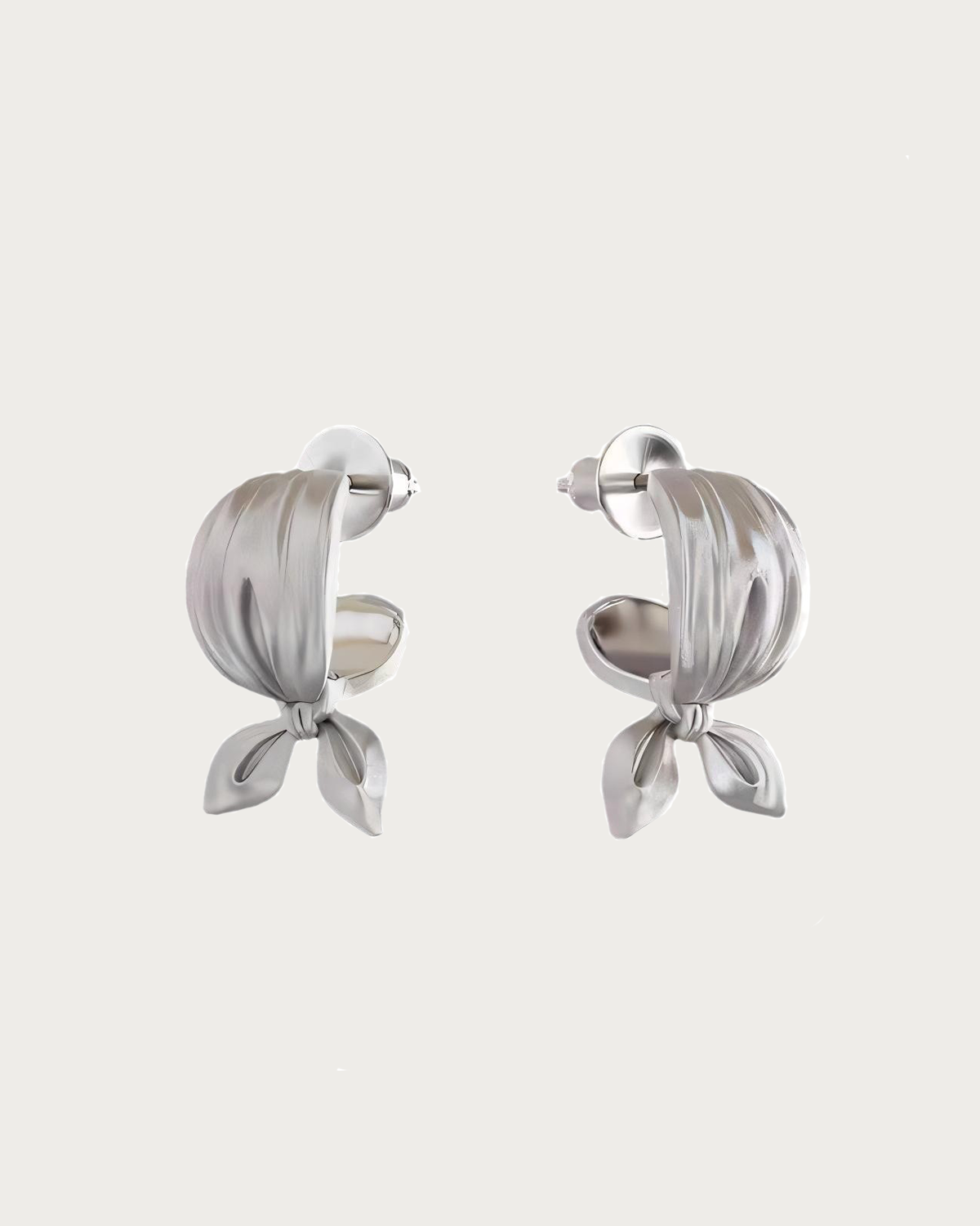Joa Bow Tie Silver Stud Earrings