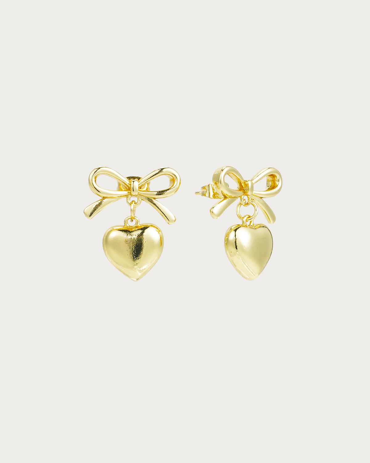 Annabelle Bow Tie Dangling Heart Golden Stud Earrings