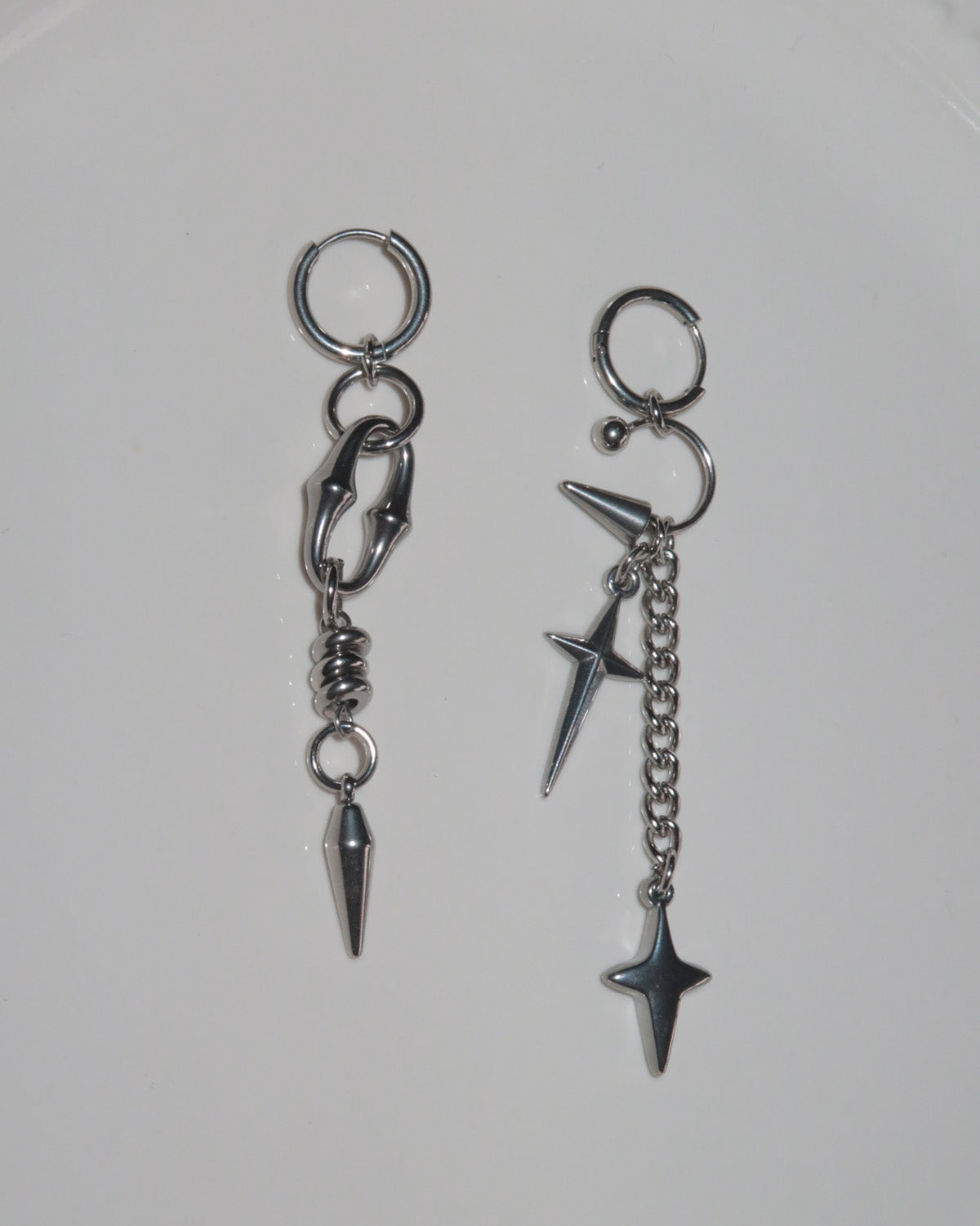 Prima Four-Point Star Horseshoe Asymmetric Silver Earrings