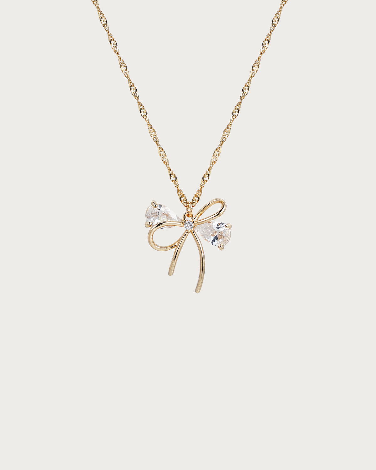 Collar dorado con cinta coqueta
