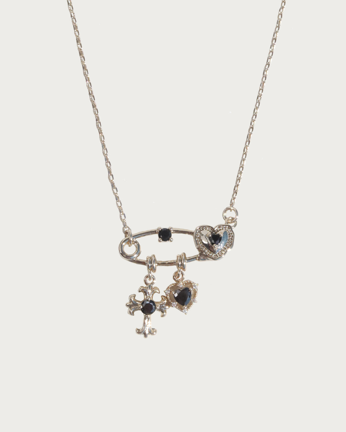 Seraphine Crystal Charm Light Golden Safety Cross Heart Necklace