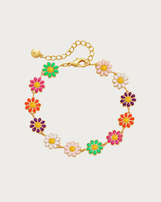 Pulsera dorada con margaritas de colores