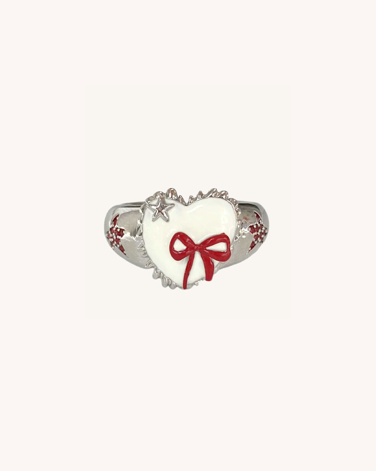 Anillo de plata con lazo rojo, estrella y corazón