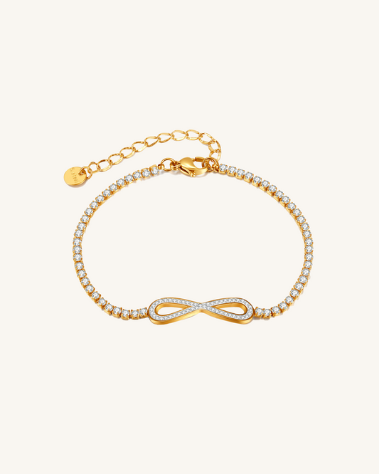 Pulsera dorada de tenis infinito
