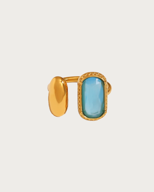 Anillo dorado de piedra azul
