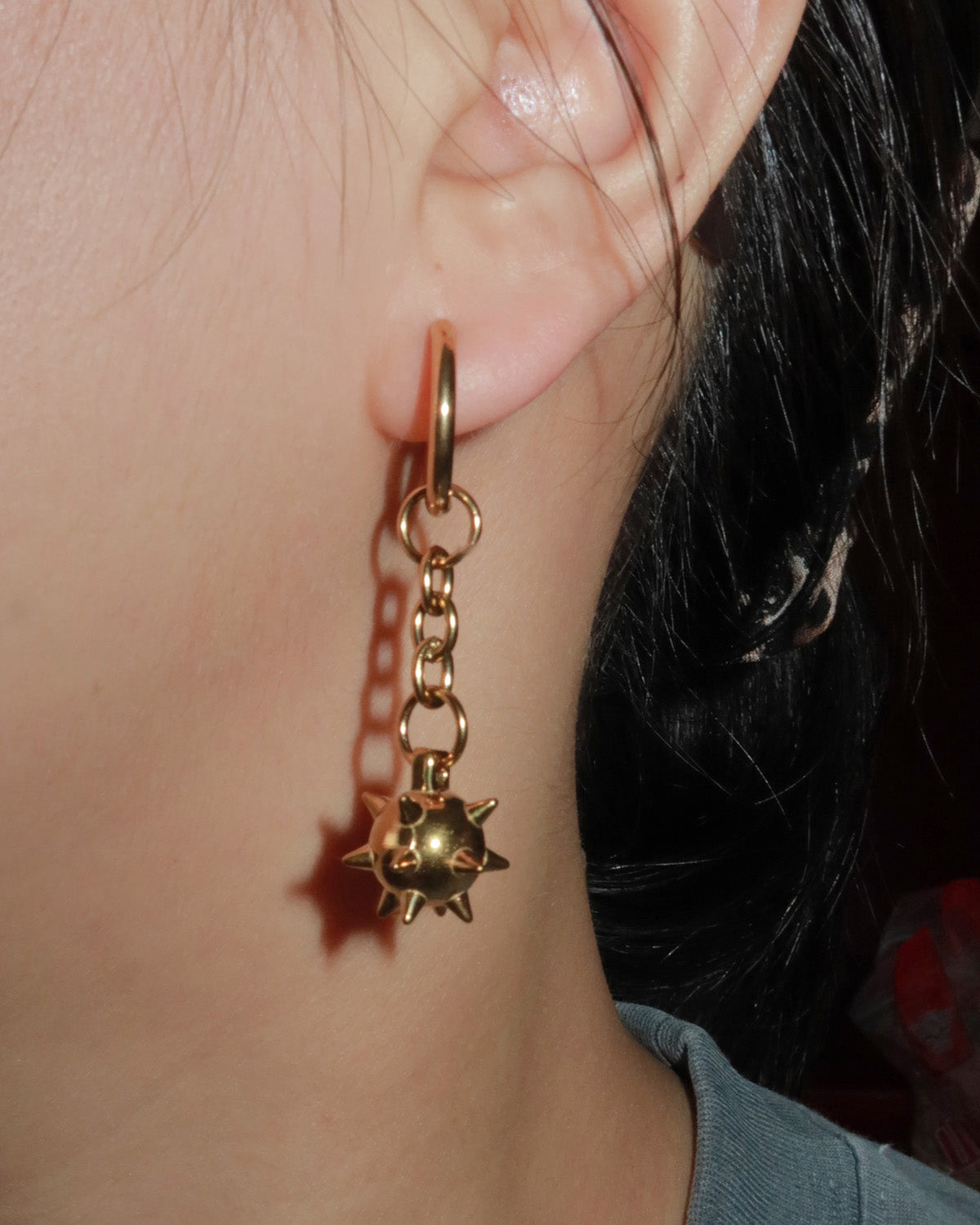 Veda Mace Charm Long Golden Drop Earrings