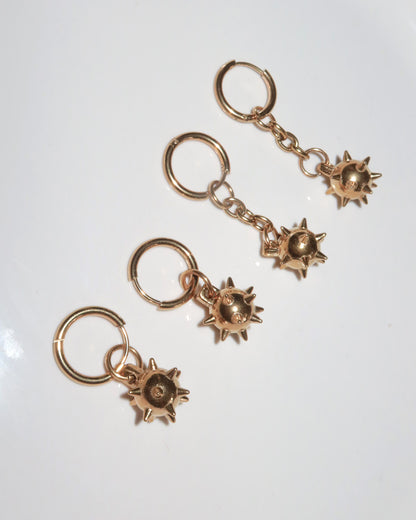 Veda Mace Charm Golden Drop Earrings