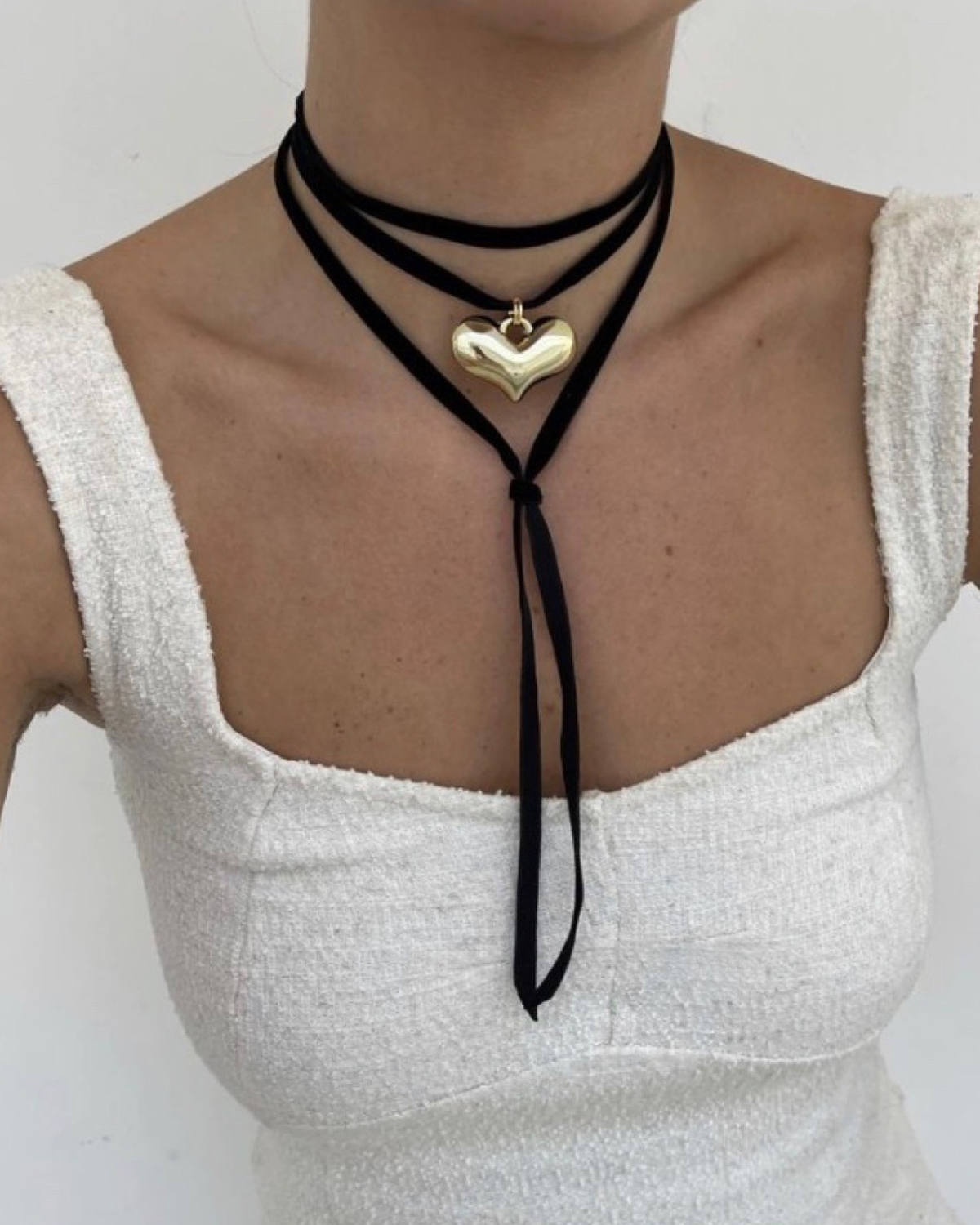 Collar con colgante de corazón de plata