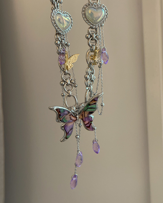Collar de plata con mariposa y corazón morado