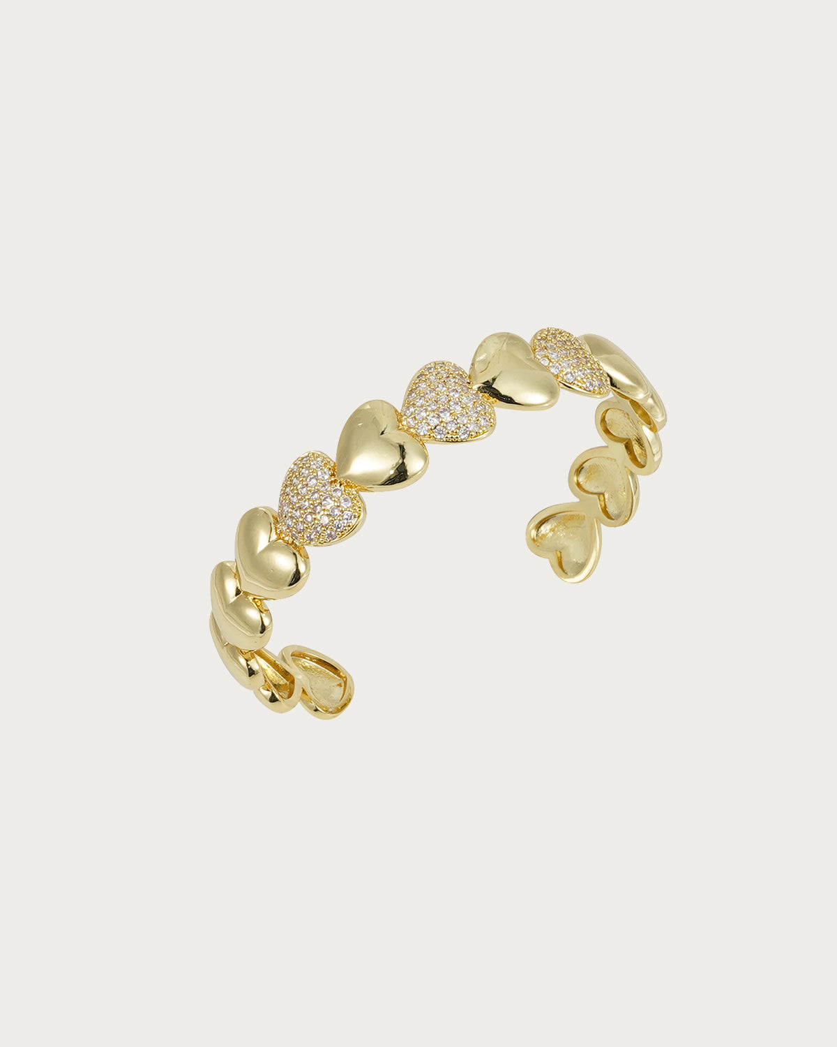 Brazalete de oro con forma de corazón