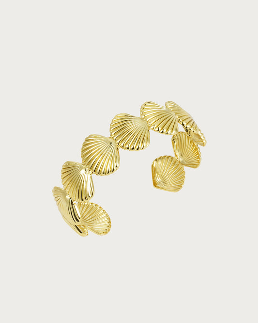 Brazalete de concha dorada