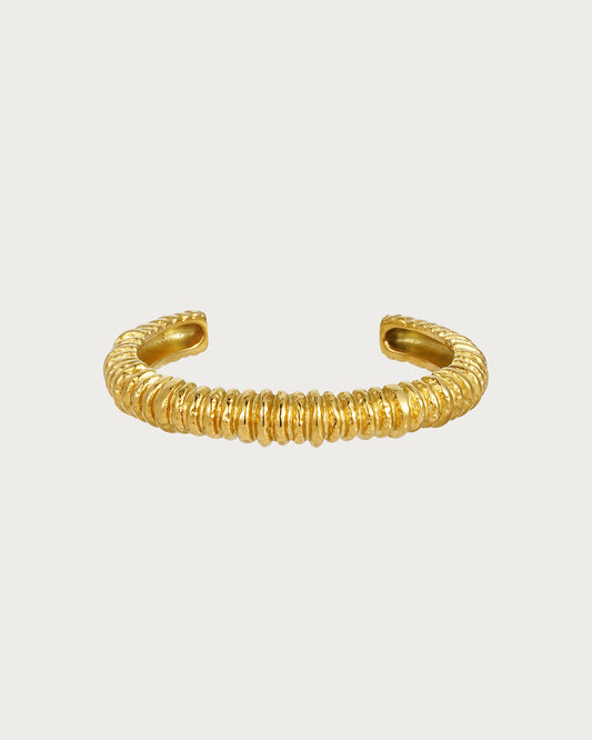 Brazalete dorado de Capital