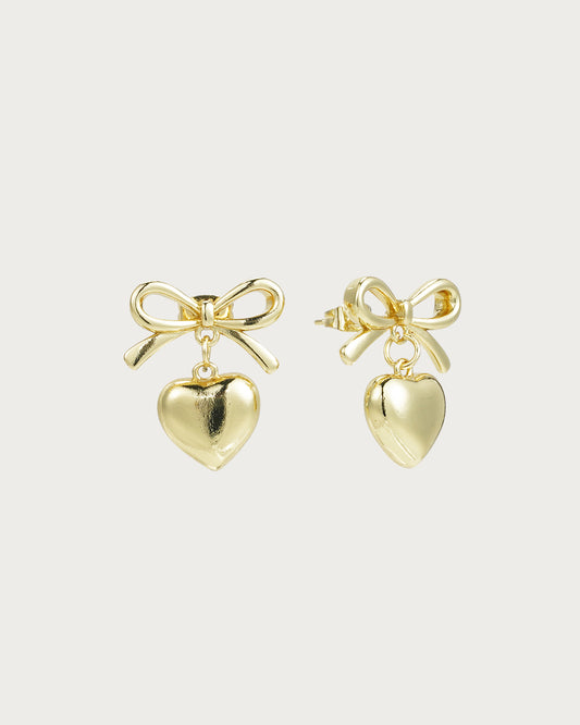Pendientes dorados con forma de corazón y pajarita