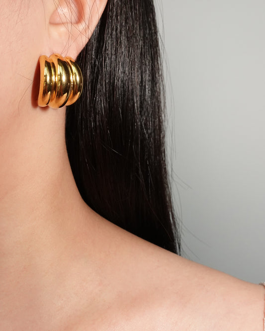 Pendientes de aro triple dorado
