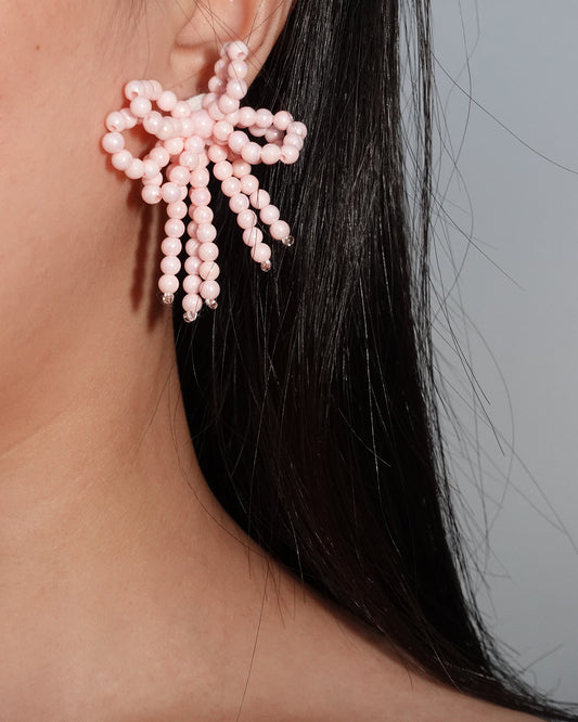 Pendientes de botón con cuentas y lazo rosa dulce