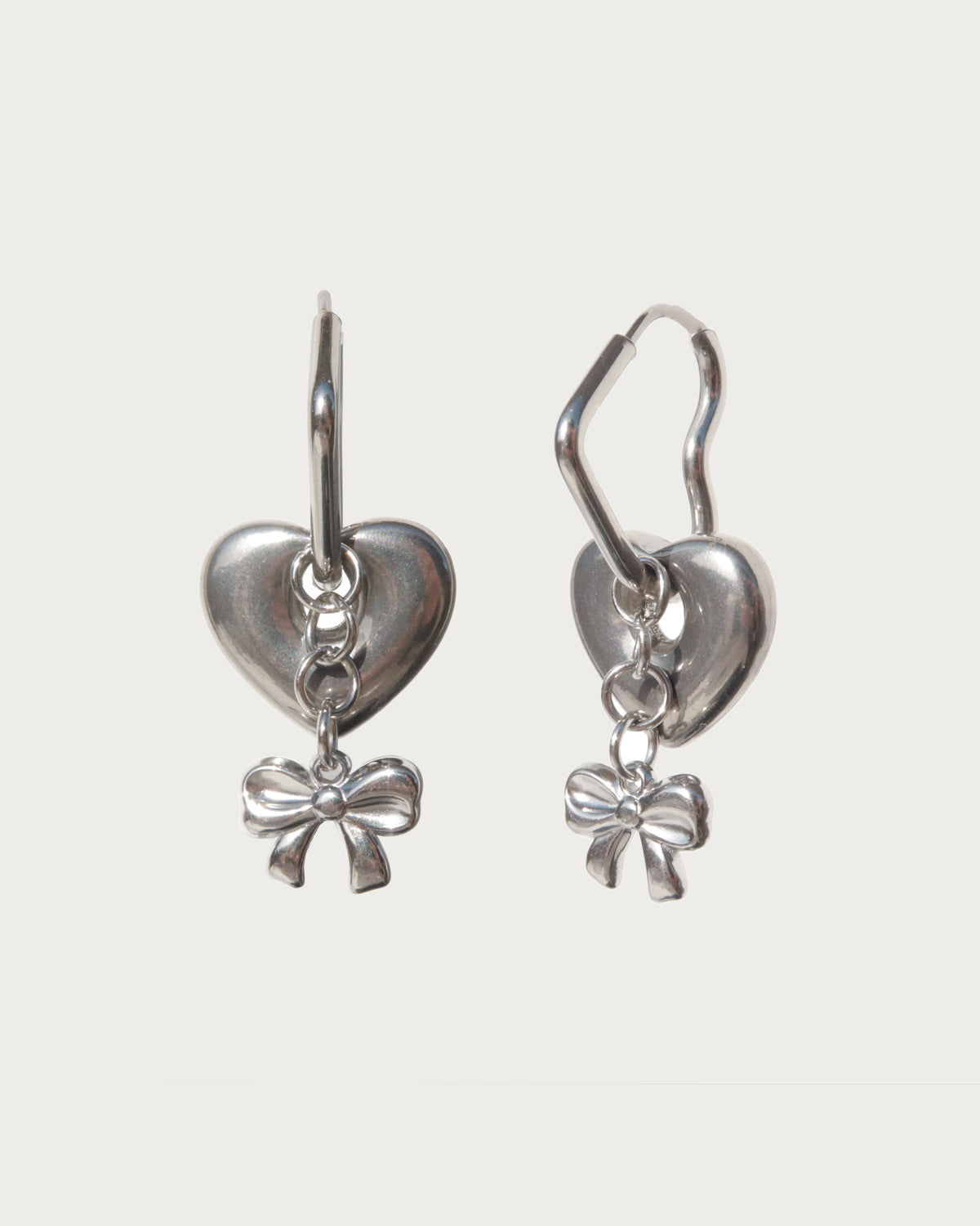 Nydia Sweet Heart Bow Charm Silver Earrings