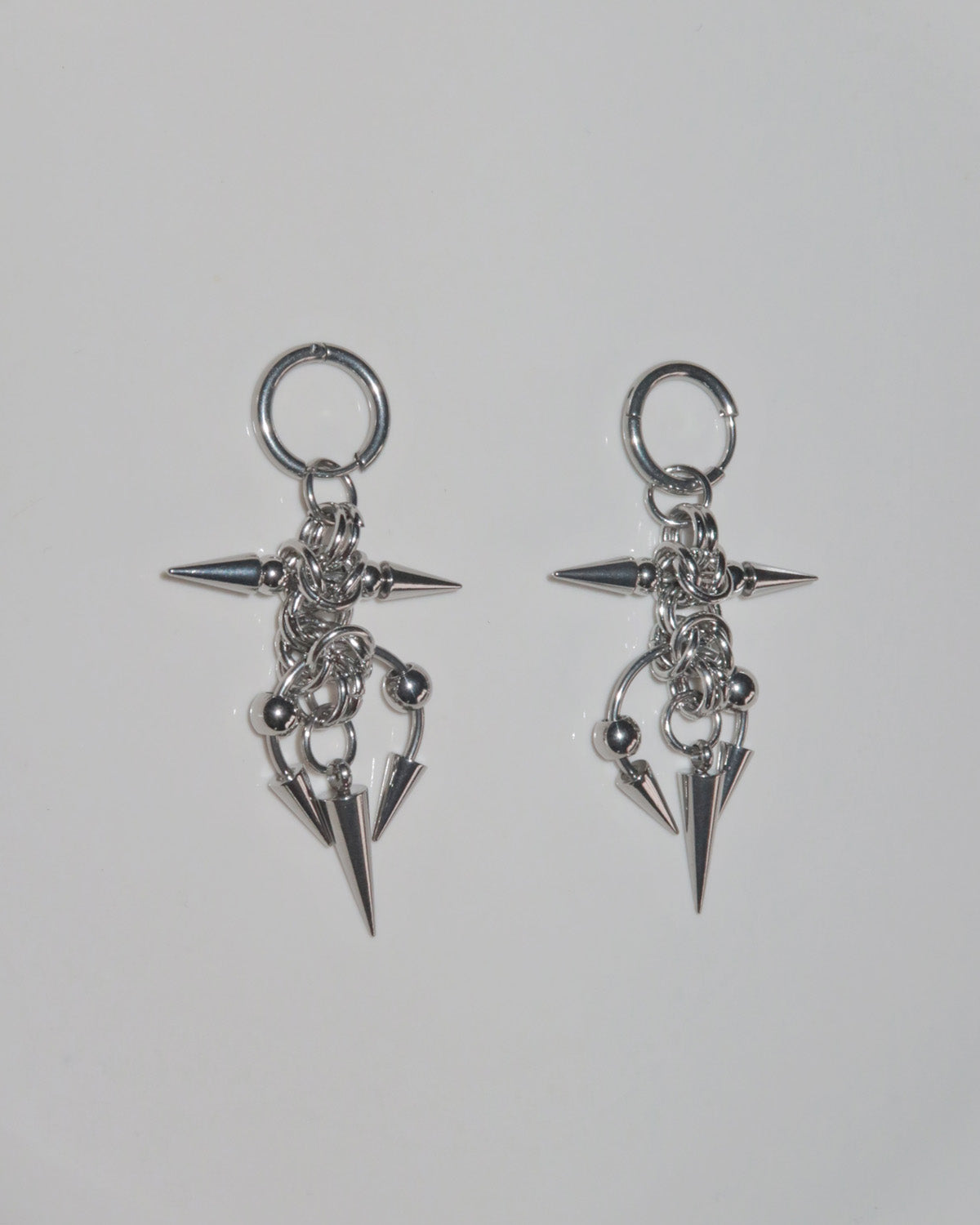 Moxie Barbed Thorn Horseshoe Silver Hoop Earrings