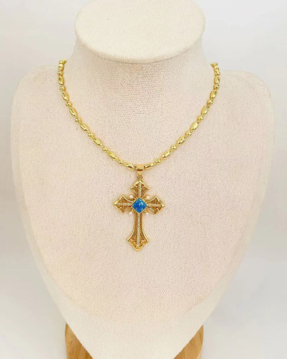 Collar con colgante de cruz dorada vintage