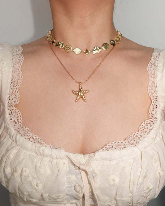 Collar dorado de concha estrella