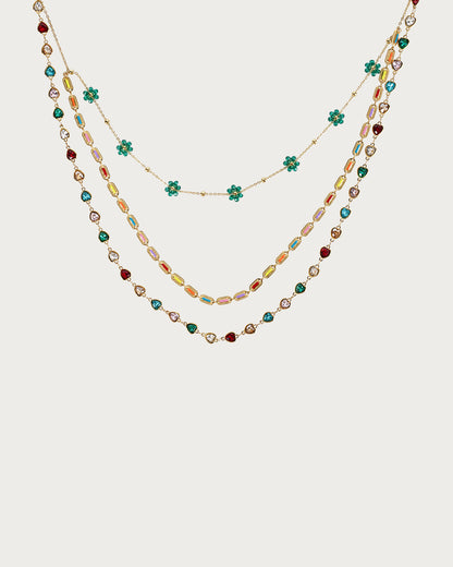 Collar dorado con cuentas de flores arcoíris