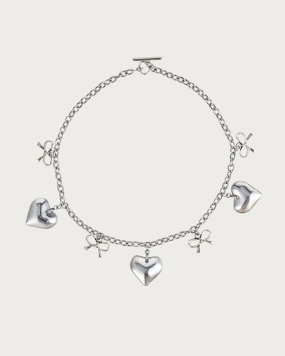Collar de plata con lazo de corazón