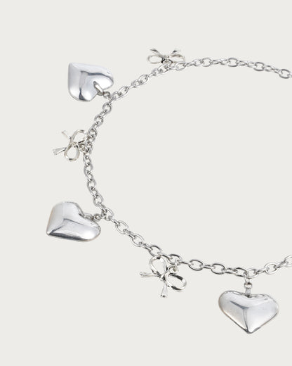 Collar de plata con lazo de corazón