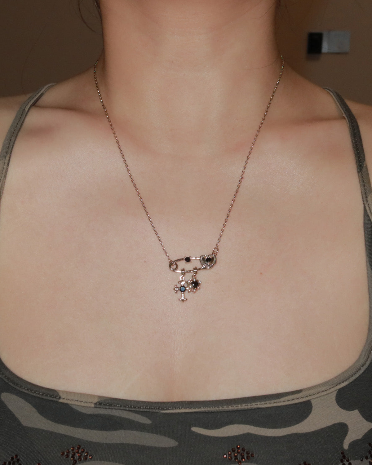 Seraphine Black Crystal Light Golden Safety Pin Cross Heart Necklace