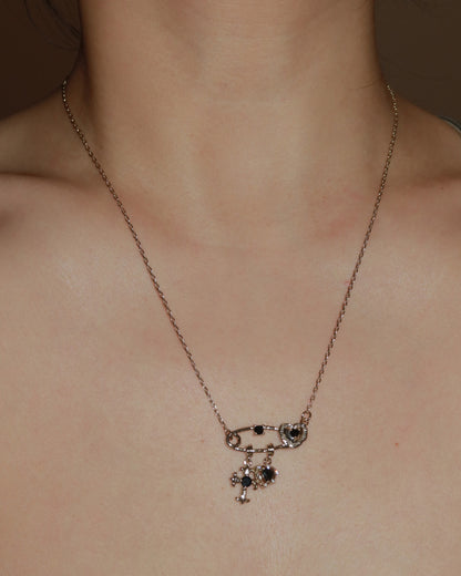 Seraphine Black Crystal Light Golden Safety Pin Cross Heart Necklace