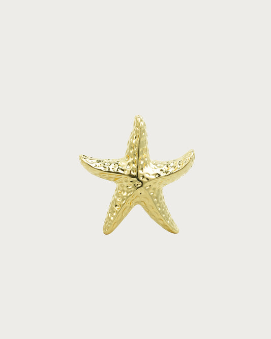 Anillo dorado con estrella de mar texturizada